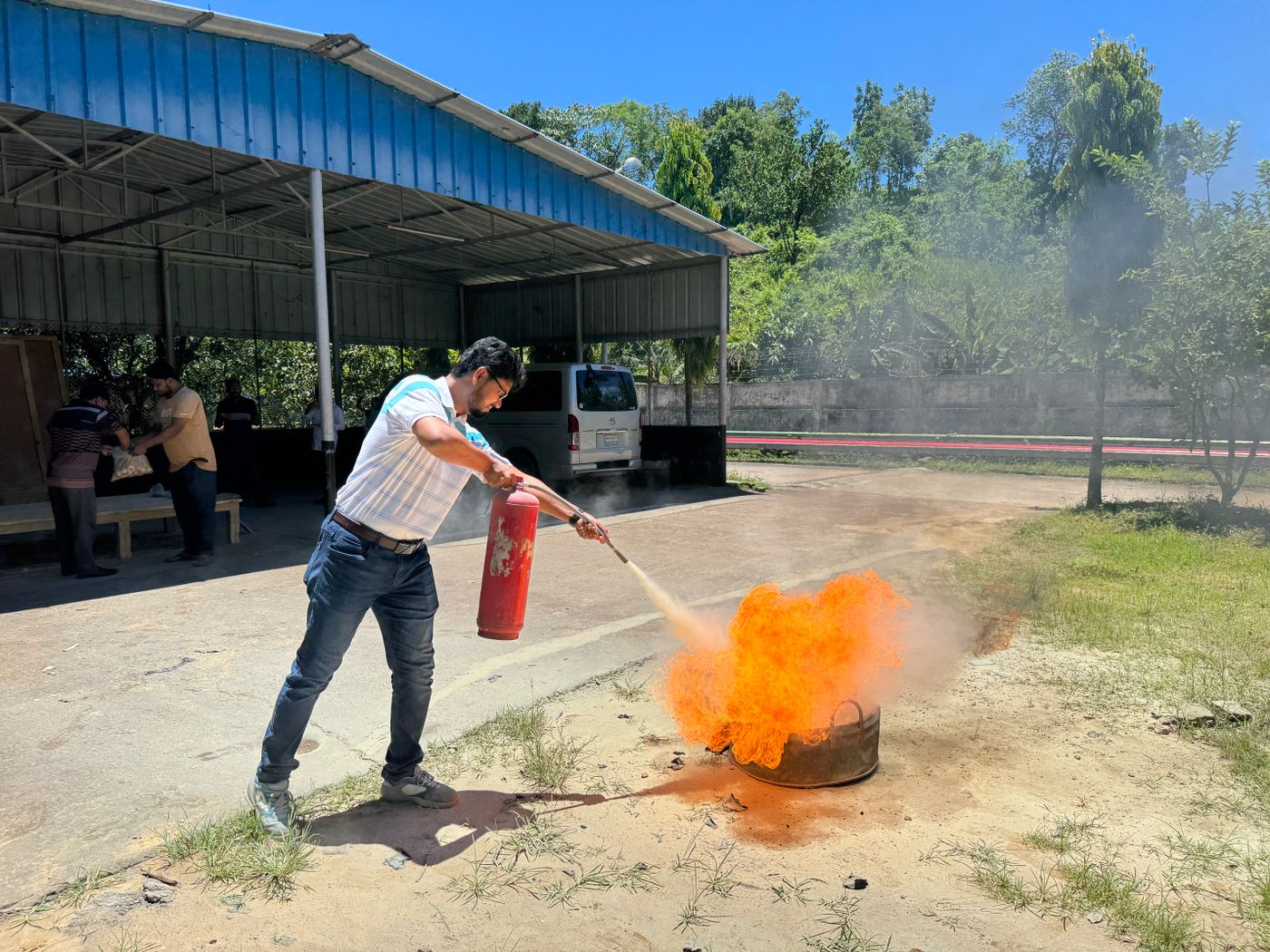 Using an extinguisher in training