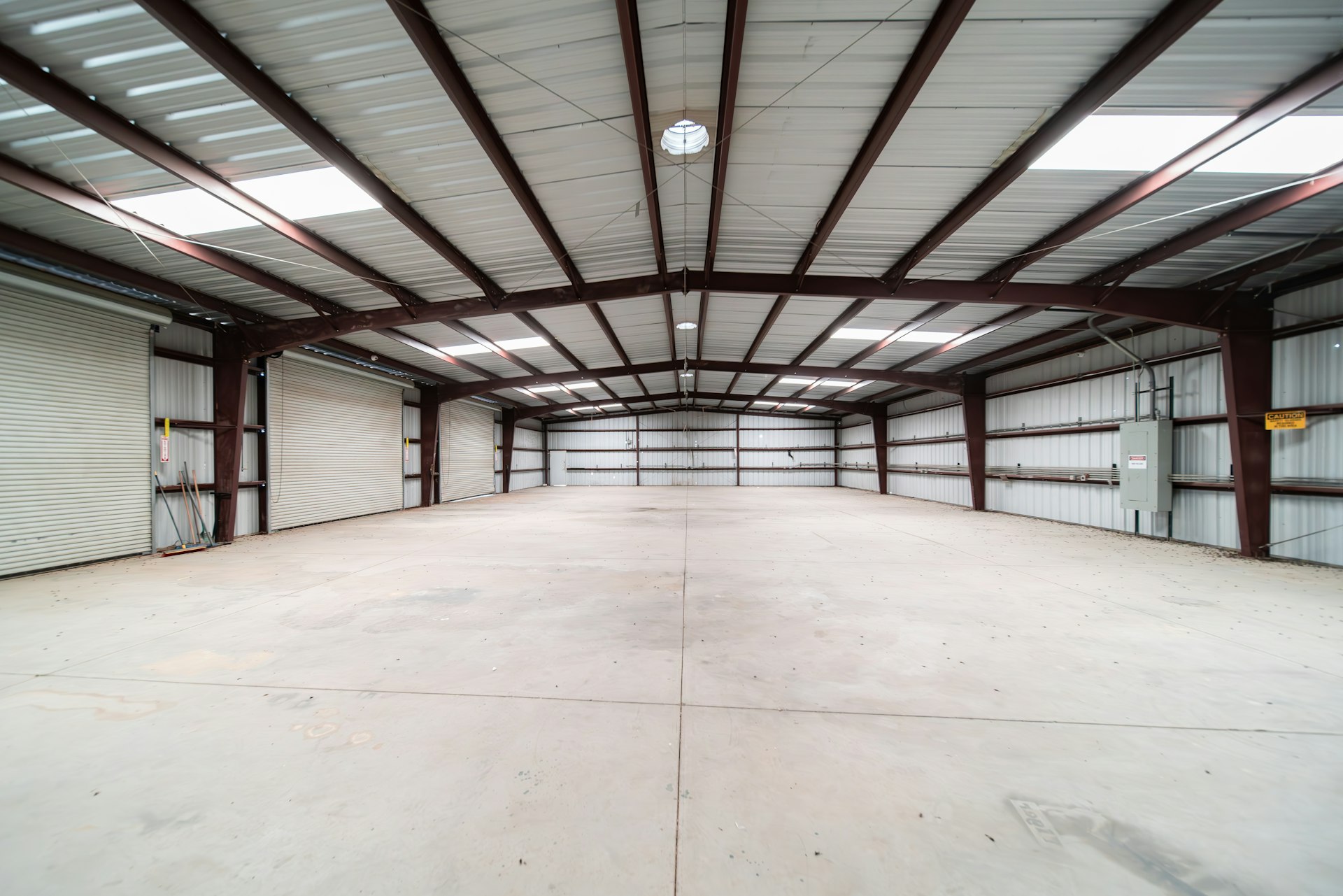 Interior of a modern industrial warehouse with steel frame construction